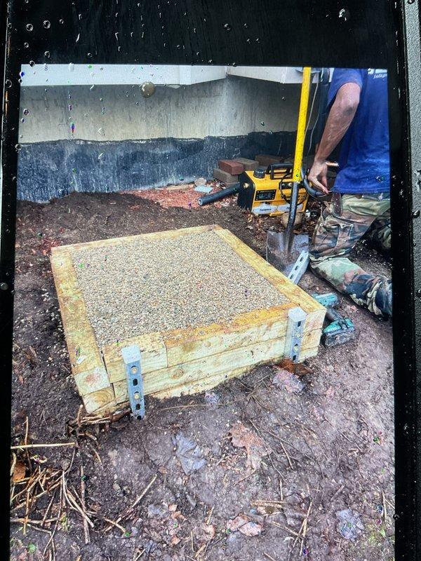 Completed installation of 90,000 BTU furnace, 3-ton rear-discharge air conditioning unit, hot water heater, and humidifier system with all necessary mechanical and electrical permits obtained. Constructed retaining wall frame with gravel base in crawl space to support outdoor condenser unit and prevent washout. Follow-up work scheduled to relocate condenser 5 feet to the left with 90-degree rotation for proper port orientation, replace incorrect breaker in electrical panel, insulate joist space with R-6 insulation, insulate PVC piping, restore insulation in venting bay, and correct fuse sizing on outdoor condenser unit.