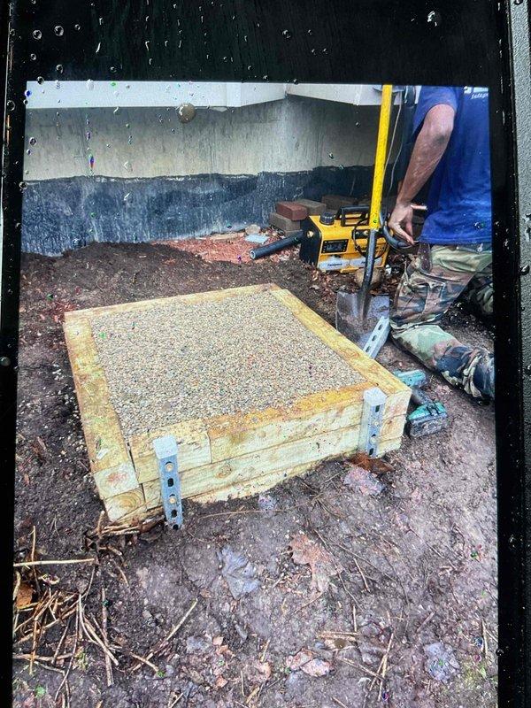 Completed installation of 90,000 BTU furnace, 3-ton rear-discharge air conditioning unit, hot water heater, and humidifier system with all necessary mechanical and electrical permits obtained. Constructed retaining wall frame with gravel base in crawl space to support outdoor condenser unit and prevent washout. Follow-up work scheduled to relocate condenser 5 feet to the left with 90-degree rotation for proper port orientation, replace incorrect breaker in electrical panel, insulate joist space with R-6 insulation, insulate PVC piping, restore insulation in venting bay, and correct fuse sizing on outdoor condenser unit.