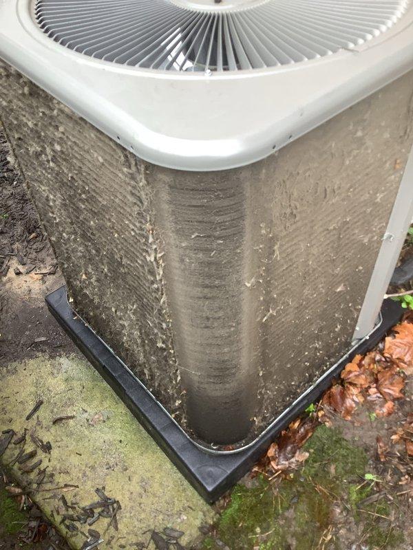 Responded to service call for outdoor condenser unit not turning on. Upon arrival, found 2-year-old air conditioning system with heavily soiled condenser coils and exterior surfaces covered in dirt, grime, organic growth, and debris accumulation. Performed diagnostic evaluation to identify cause of no-power condition. Thoroughly cleaned condenser coils and exterior fins to remove dirt buildup and restore proper airflow. Cleared organic debris from unit base and surrounding area. Inspected electrical connections, contactor, capacitor, and control circuits. Tested system operation and verified proper startup sequence. Unit restored to normal operation with adequate airflow through cleaned coils. Both parts and labor covered under existing warranty.