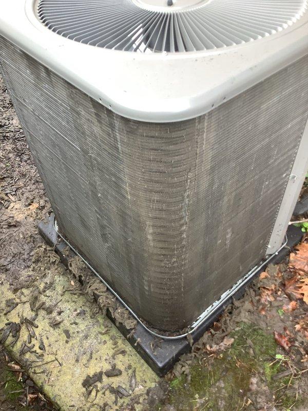 Responded to service call for outdoor condenser unit not turning on. Upon arrival, found 2-year-old air conditioning system with heavily soiled condenser coils and exterior surfaces covered in dirt, grime, organic growth, and debris accumulation. Performed diagnostic evaluation to identify cause of no-power condition. Thoroughly cleaned condenser coils and exterior fins to remove dirt buildup and restore proper airflow. Cleared organic debris from unit base and surrounding area. Inspected electrical connections, contactor, capacitor, and control circuits. Tested system operation and verified proper startup sequence. Unit restored to normal operation with adequate airflow through cleaned coils. Both parts and labor covered under existing warranty.
