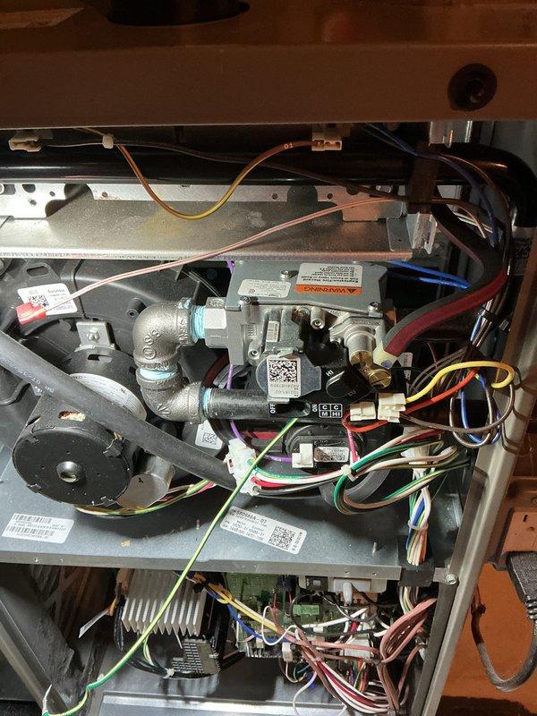 Completed annual heating check on residential furnace system. Performed comprehensive inspection of gas valve assembly, electrical connections, and all internal components. Inspected and serviced humidifier pad as noted in service requirements, examining all wire connections, draft inducer motor, and control board functionality to ensure proper operation for the upcoming heating season.