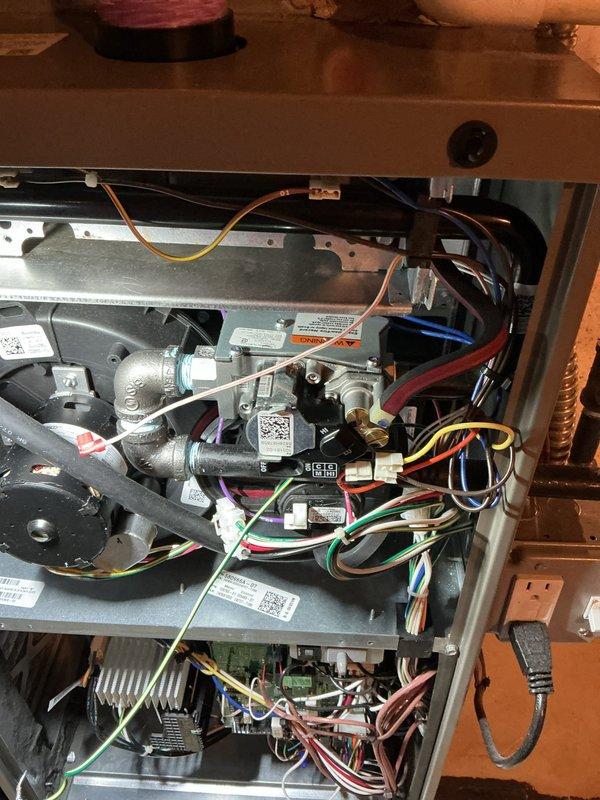 Completed annual heating check on residential furnace system. Performed comprehensive inspection of gas valve assembly, electrical connections, and all internal components. Inspected and serviced humidifier pad as noted in service requirements, examining all wire connections, draft inducer motor, and control board functionality to ensure proper operation for the upcoming heating season.