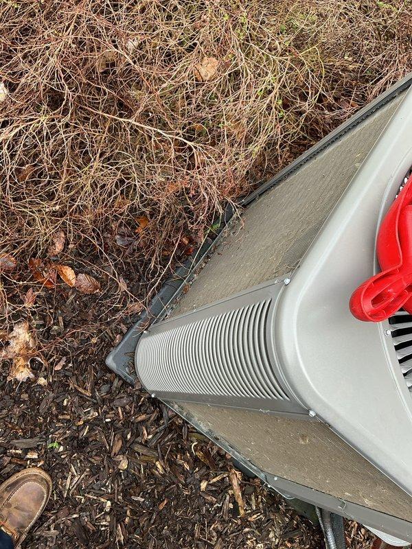 Completed annual preventive maintenance on Lennox model CX35-24B-6F-20 heat pump system. Performed comprehensive inspection of outdoor condenser unit, verified all manufacturer labels and safety notices intact, documented equipment model and serial number, and confirmed unit operational status. Cleared debris from surrounding area and ensured proper airflow clearance around equipment.