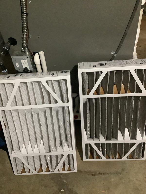 Completed routine HVAC maintenance inspection including filter replacement and system evaluation. Inspected air handler unit, replaced dirty air filters with new units, and examined burner assembly and gas connections to ensure proper operation. All heating and cooling system components found to be functioning within normal parameters.