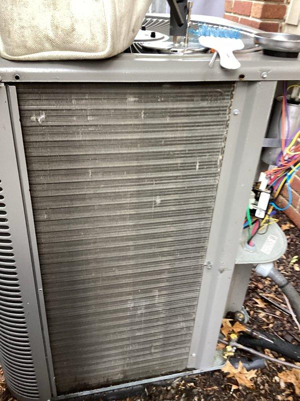 Completed annual cooling maintenance on residential air conditioning system. Performed comprehensive inspection of outdoor condensing unit, noting significant accumulation of dirt and debris on condenser coils requiring attention. Documented heavily soiled coil surfaces with substantial buildup affecting heat transfer efficiency. Inspected all electrical connections, wiring, and control components, confirming proper terminations and secure connections. Verified refrigerant line connections and service valves for integrity. System operational at time of inspection with no immediate failures detected. Customer declined spot cleaning service and opted to renew annual maintenance agreement for continued coverage.