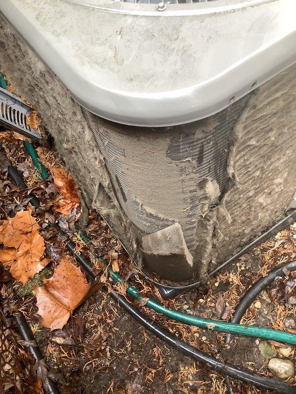 Completed annual cooling maintenance on outdoor HVAC unit, including filter and evaporative cooler pad replacement as scheduled. Unit exterior insulation shows significant weathering and deterioration that may require future attention, though system remains operational. Cleared surrounding debris and verified proper drainage line function.