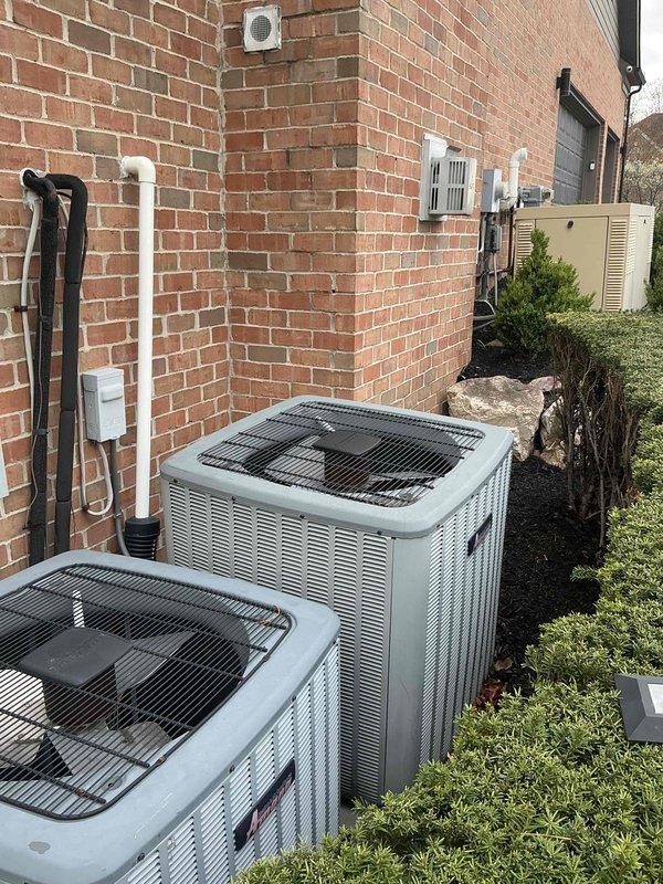 Provided estimate for complete HVAC system replacement including basement-installed natural gas furnace and exterior air conditioning condenser unit under BOGO promotion. Existing 23-year-old Bryant furnace remains operational while 15+ year-old AC unit is non-functional, requiring full replacement of both systems to restore complete heating and cooling capabilities.