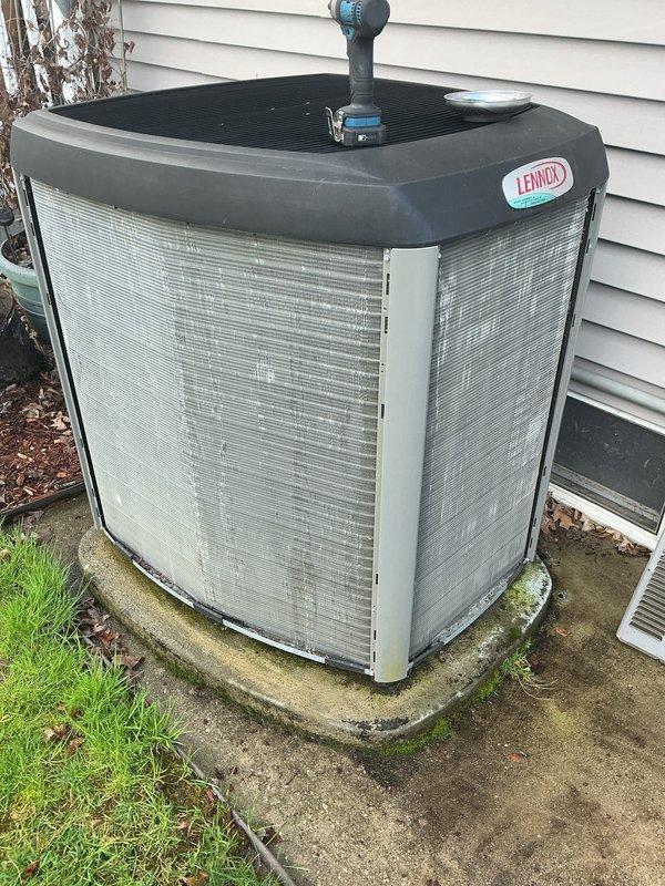 Completed annual cooling maintenance on residential Lennox air conditioning condenser unit. Performed comprehensive system inspection including visual assessment of unit condition, refrigerant lines, and electrical connections. Unit found to be in operational condition with no immediate repairs needed. Observed minor algae growth on concrete pad but unit accessibility and airflow remain unobstructed. Customer renewed recurring Air Care Cooling service agreement for continued preventative maintenance coverage.