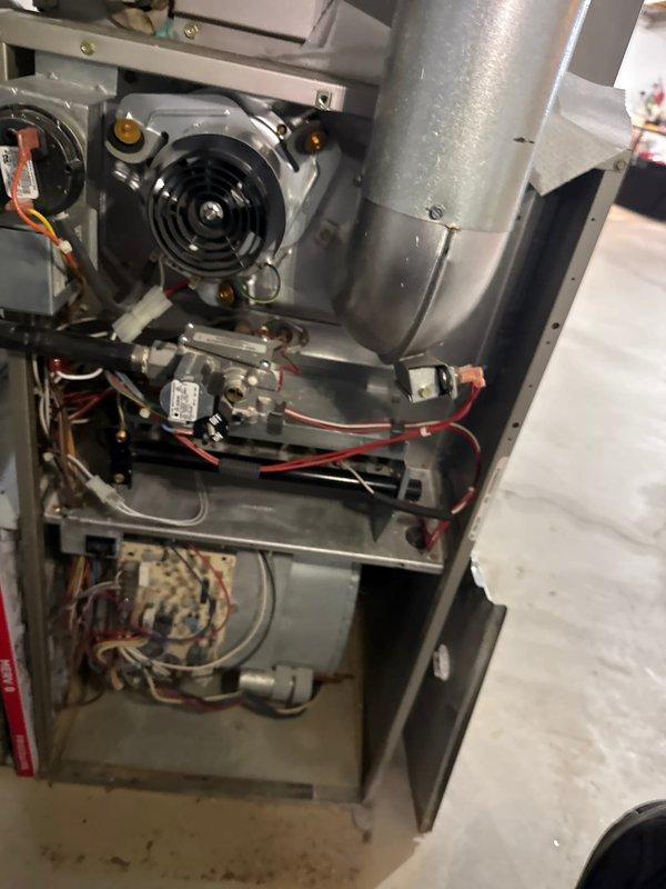 Completed comprehensive spring maintenance inspection on residential HVAC system following winter season. Performed full AC tune-up on 10-year-old unit, inspecting blower motor assembly, electrical connections, gas line connections, burner assembly, and heat exchanger components. Verified all wiring connections secure, including control wiring and safety circuits. Inspected inducer motor assembly, condensate drain lines, and PVC venting system for proper operation. System tested and confirmed operational with no issues found; unit ready for upcoming cooling season.
