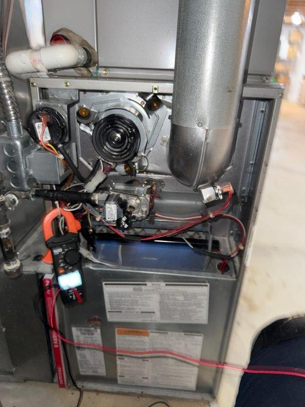 Completed comprehensive spring maintenance inspection on residential HVAC system following winter season. Performed full AC tune-up on 10-year-old unit, inspecting blower motor assembly, electrical connections, gas line connections, burner assembly, and heat exchanger components. Verified all wiring connections secure, including control wiring and safety circuits. Inspected inducer motor assembly, condensate drain lines, and PVC venting system for proper operation. System tested and confirmed operational with no issues found; unit ready for upcoming cooling season.