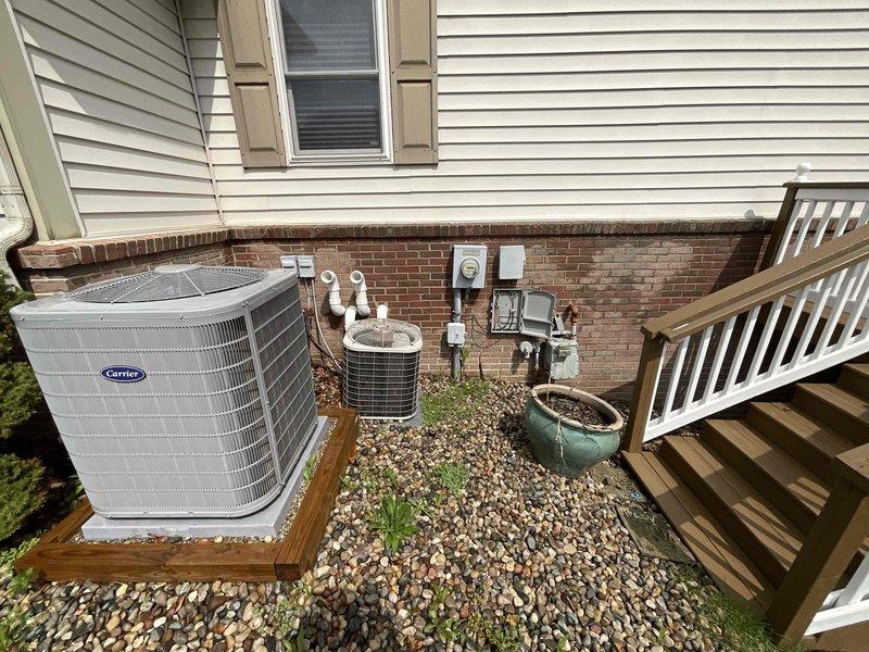 Conducted comprehensive assessment of 25-year-old furnace and air conditioning system located in basement for replacement estimate. Both units currently operational but have reached end of expected service life. Evaluated existing Carrier outdoor condenser unit, associated refrigerant lines, electrical connections, and indoor furnace components to determine specifications for replacement equipment and identify any necessary upgrades to ductwork, electrical service, or venting systems required for new installation.