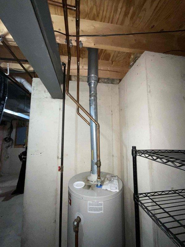 Conducted comprehensive assessment of 25-year-old furnace and air conditioning system located in basement for replacement estimate. Both units currently operational but have reached end of expected service life. Evaluated existing Carrier outdoor condenser unit, associated refrigerant lines, electrical connections, and indoor furnace components to determine specifications for replacement equipment and identify any necessary upgrades to ductwork, electrical service, or venting systems required for new installation.