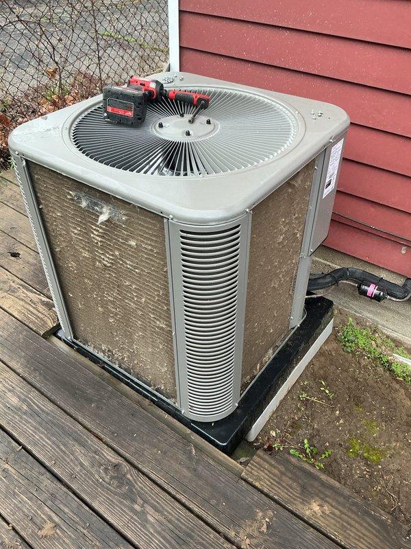 Completed scheduled preventive maintenance on residential outdoor air conditioning condenser unit. Performed comprehensive system inspection including temperature and pressure diagnostics, verified proper operation of fan motor and compressor, and assessed overall equipment condition. Unit found to be operating within normal parameters with exterior showing typical weathering but maintaining functional integrity.