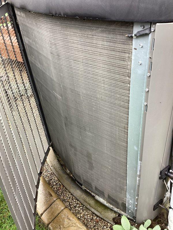 Completed annual preventative maintenance on outdoor condensing unit. Removed and cleaned condenser coil which showed moderate accumulation of dust, debris, and organic matter on fins and mesh screening. Inspected refrigerant lines, electrical connections, and compressor housing—all components found to be in operational condition with no immediate repairs required.