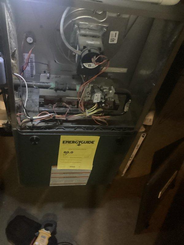 Completed comprehensive HVAC maintenance inspection on residential furnace unit. Removed access panels to inspect internal components including blower motor assembly, gas valve mechanisms, electrical connections, and refrigerant lines. All major components were examined for proper operation, wiring integrity verified, and system found to be in operational condition with no immediate repairs required.
