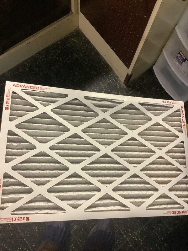 Completed routine air conditioning maintenance including system inspection and filter replacement. Installed new 10x25x1 pleated air filter and verified system operating temperatures, with supply air measuring 55°F indicating proper cooling performance.