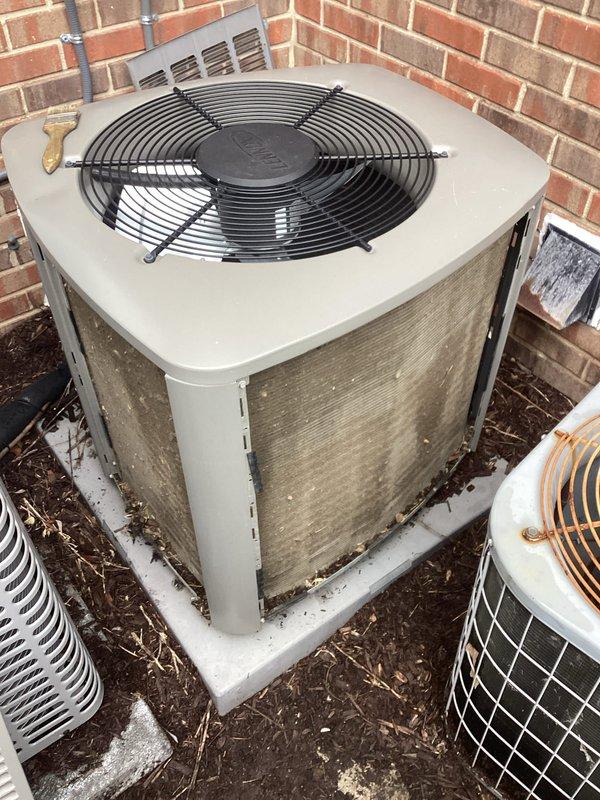 Completed annual cooling maintenance on residential air conditioning system. Performed comprehensive system diagnostics using digital manifold gauges, recording refrigerant pressures and temperatures across all service ports to verify proper system operation and charge levels. Inspected outdoor condenser unit, noting accumulated dirt and debris on cabinet surfaces; unit operational with condenser fan functioning properly.