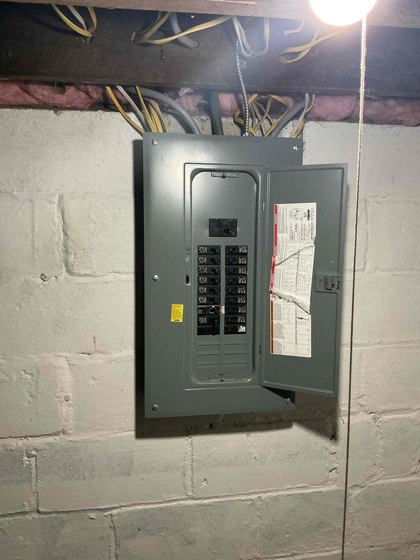 Conducted on-site evaluation for complete air conditioning system replacement at residential property. Assessed existing HVAC infrastructure including Goodman furnace unit, ductwork distribution system, and electrical panel capacity in basement mechanical room. Documented current equipment configuration, PVC venting arrangement, sheet metal ductwork connections, and electrical service panel to determine specifications and requirements for new AC system installation.