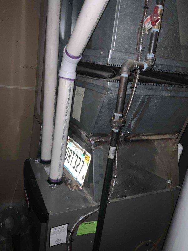 Conducted on-site assessment for air conditioning system replacement on aging residential unit. Evaluated existing HVAC infrastructure including furnace installation, electrical service capacity at exterior meter location, and overall system configuration to provide comprehensive replacement quote for new air conditioning equipment.