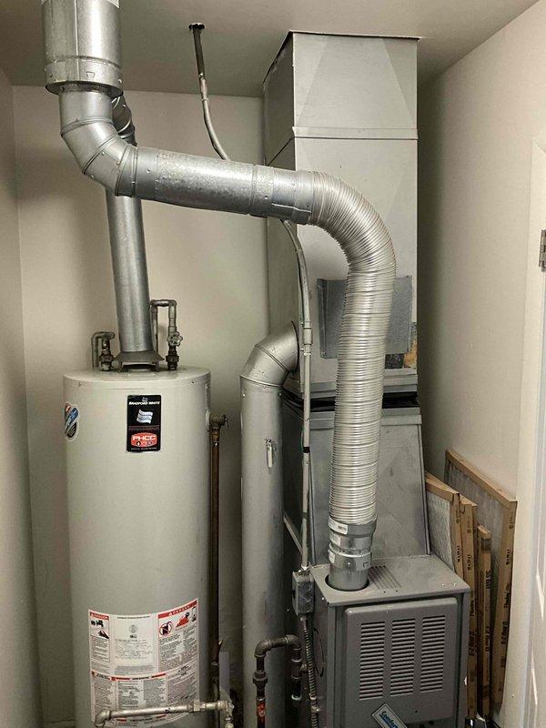 Provided comprehensive estimate for new air conditioning system installation at residential property with natural gas furnace. Assessment included evaluation of outdoor placement area between structures for condenser unit location and review of existing indoor HVAC equipment configuration in utility room. Estimate encompasses new A/C system installation with required electrical work to support new equipment.