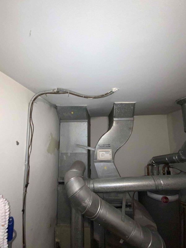 Completed on-site evaluation of existing HVAC system for replacement estimate. Inspected 20-year-old furnace and air conditioning equipment currently installed in utility room. Assessed condition of air handler, ductwork connections, and associated components. Documented existing equipment specifications, installation configuration, and mechanical room layout through photographs. Provided comprehensive replacement quote for both heating and cooling systems to facilitate customer's purchasing decision.