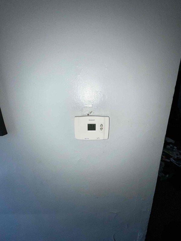 Completed comprehensive site evaluation for replacement of existing 10-year-old air conditioning system and furnace. Assessed current equipment condition, documented existing Honeywell thermostat, inspected installation location in basement storage area, and reviewed system layout including ductwork accessibility. Provided detailed estimate options focused on high-efficiency replacement equipment to meet energy savings requirements.