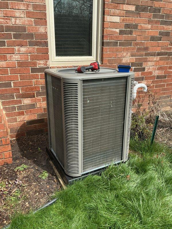 Completed routine Air Care Cooling maintenance on residential outdoor condensing unit. Performed standard ACM procedures including inspection of condenser coils, verification of proper airflow through louvered panels, and assessment of unit operation. Unit found in satisfactory working condition with no immediate repairs required.