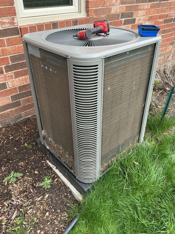 Completed routine Air Care Cooling maintenance on residential outdoor condensing unit. Performed standard ACM procedures including inspection of condenser coils, verification of proper airflow through louvered panels, and assessment of unit operation. Unit found in satisfactory working condition with no immediate repairs required.