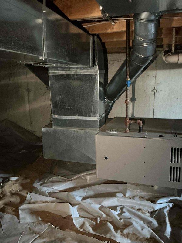 Conducted estimate for replacement of 26-year-old HVAC system including furnace, air conditioning unit, and water heater. Inspected existing Lochinvar water heater in walkway area showing signs of age and confirmed non-operational status. Evaluated furnace and air handler unit located in crawlspace with existing ductwork, copper piping, and ventilation systems currently operational. Documented equipment conditions, installation locations, and accessibility for replacement planning. Provided comprehensive assessment and replacement recommendations for all three units based on age, condition, and performance requirements.