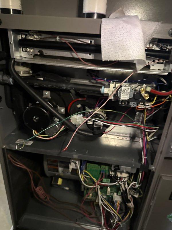 Completed annual heating check on residential HVAC system. Performed comprehensive inspection of all internal components including blower motor assembly, gas valve connections, electrical wiring, control boards, and heat exchanger. Verified proper operation of capacitors, checked all wire connections for security and signs of wear, and inspected circuit boards for functionality. All components found to be in good working order with no issues identified during inspection.