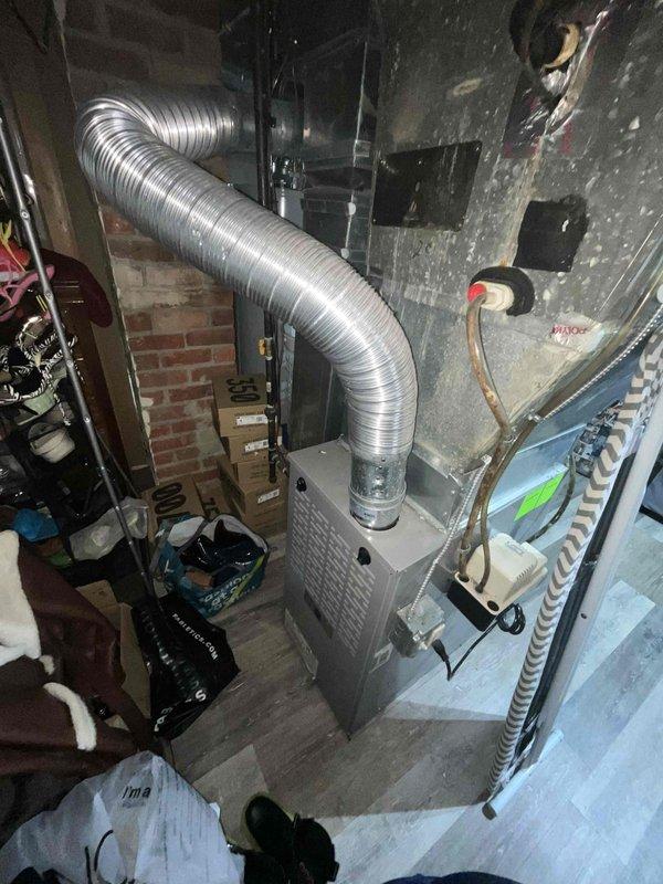 Conducted estimate for replacement of 25-year-old air conditioning system. Assessed existing HVAC installation in basement, including furnace/air handler unit mounted on platform with flexible aluminum ductwork, refrigerant lines, and associated components. Documented current system configuration and photographed equipment layout, ductwork routing through attic space, and mechanical infrastructure to provide comprehensive replacement quote for upcoming installation scheduled next month.