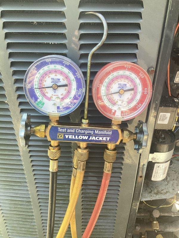 Completed annual cooling maintenance on two residential AC units. Performed system inspections, replaced air filters and evaporator pads on both systems, cleaned heavily soiled condenser coils that showed significant dirt and debris accumulation, checked refrigerant pressures and electrical connections, and verified proper system operation. Both units tested and running efficiently after service.