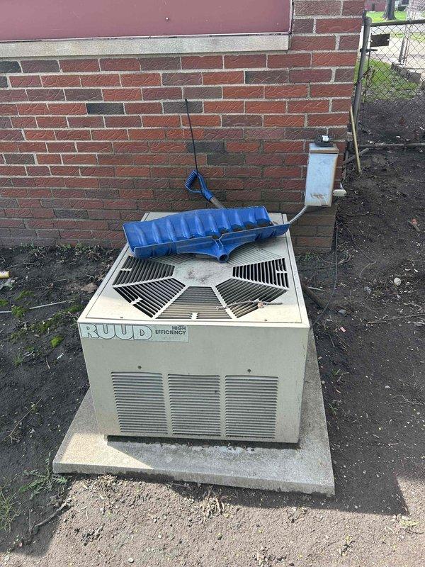 Completed full system estimate for residential HVAC replacement including existing RUUD furnace located in basement and RUUD air conditioning condenser unit positioned on exterior concrete pad. Assessed current system configuration, ductwork, venting, and condensate drainage setup to provide comprehensive quote for furnace and AC replacement under promotional offer, with customer requesting service within the next couple weeks.