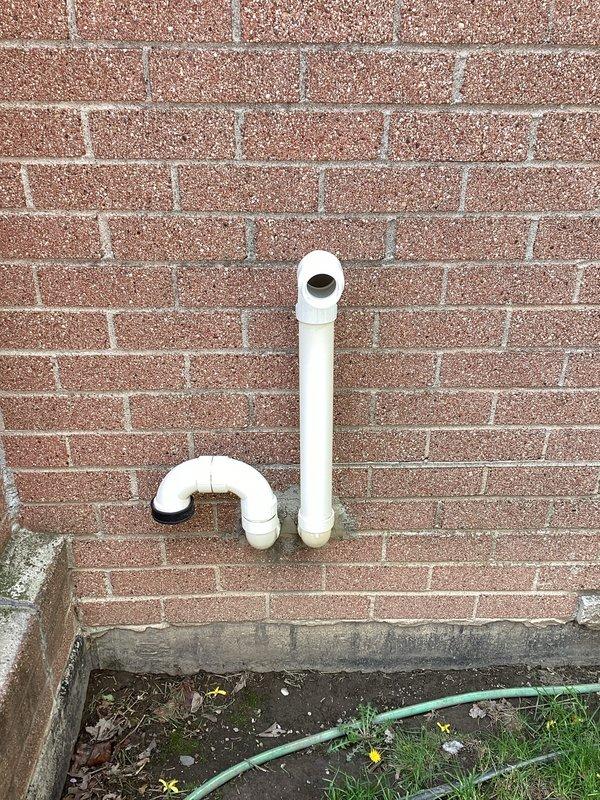 Completed installation of 70,000 BTU furnace unit with all necessary mechanical and electrical connections. Reconnected existing system components and verified proper operation of all furnace functions. Installed PVC condensate drain and vent piping routed through exterior brick wall with proper pitch and termination points to ensure efficient drainage and venting.