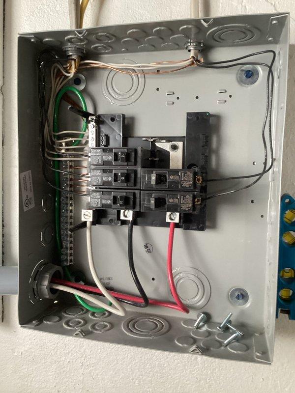 Successfully installed a 2-ton air conditioning system with matching evaporator coil at rear location. Completed electrical connections to existing breaker panel, installed new dedicated circuit breaker for AC unit, and reconnected all electrical wiring per code requirements. All mechanical, electrical, and AC permits were obtained prior to installation, and system was tested for proper operation upon completion.
