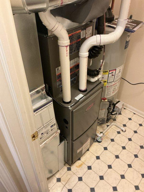 Completed full HVAC system installation including a 70,000 BTU furnace and 2-ton air conditioning unit with rear discharge configuration. Obtained necessary mechanical permits prior to installation and reconnected all utility connections. Applied for available utility rebates through Consumers Energy and DTE on behalf of property owner.