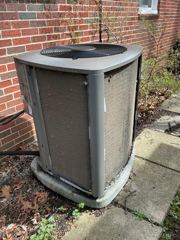 Completed annual preventive maintenance on residential rooftop condenser unit. Inspected exterior cabinet, coil condition, and fan assembly; unit operational with no immediate service needs identified. Noted minor debris accumulation around base and recommended continued seasonal monitoring.