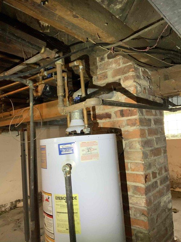 Completed comprehensive HVAC system estimate for medium-sized residential property requiring full heating and cooling system replacement in basement location. Assessed existing infrastructure including gas-fired equipment, electrical service panel capacity, venting through masonry chimney, and available space for new natural gas or propane furnace and air conditioning system sized appropriately for 1200-2000 square foot application. Documented current mechanical room layout, utility connections, and provided detailed quote for complete system installation.