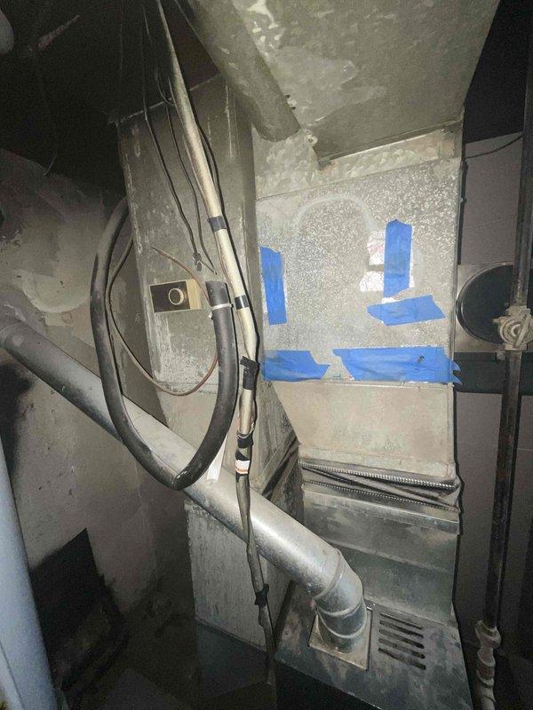 Conducted site assessment for AC replacement in basement mechanical space. Evaluated existing HVAC infrastructure, including ductwork configuration, electrical routing, and available installation space for new air conditioning system. Documented current equipment layout, pipe runs, and utility connections to determine optimal placement and integration requirements for proposed AC unit.