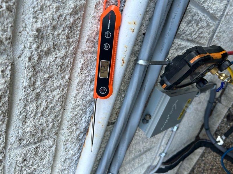 Responded to no airflow complaint on 3-year-old AC system. Upon arrival, confirmed outdoor unit running but no air delivery from supply registers. Performed diagnostic evaluation of indoor air handler and discovered evaporator coil completely frozen with heavy ice accumulation. Measured suction line temperature at outdoor unit showing 83°F, indicating restricted airflow across indoor coil. Shut system down to allow coil to thaw completely. Inspected air filter and found severely clogged condition restricting airflow. Replaced dirty filter with new filter. After thaw cycle completed, verified evaporator coil clear of ice and resumed system operation. Monitored system performance and confirmed proper airflow restored to all vents, suction line temperatures returning to normal range, and adequate cooling capacity. Advised customer on importance of regular filter maintenance to prevent future freezing issues.