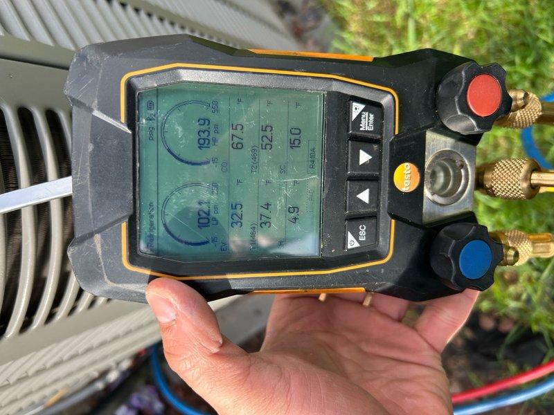 Responded to no-cool call on 15-year-old central air conditioning system. Upon arrival, confirmed outdoor condenser unit was not operating and thermostat was clicking but system failed to produce cold air. Customer also reported water leaking from furnace unit. Performed diagnostic evaluation of outdoor condenser unit, which showed heavy accumulation of dirt, grime, and debris on exterior surfaces and condenser coils, indicating extended period without maintenance. Connected HVAC diagnostic gauges to measure system pressures and temperatures. Readings indicated abnormal refrigerant pressures consistent with system failure. Inspected condenser fan motor and compressor for operation. Evaluated electrical connections and capacitor condition. Assessed condensate drainage from indoor evaporator coil, which was likely source of water leakage at furnace unit due to clogged drain line or frozen evaporator coil from lack of airflow. Given age of equipment at 15 years and extent of deferred main