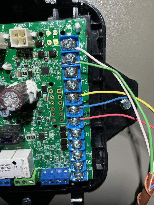 Responded to service call for non-operational condenser fan on 4-month-old outdoor A/C unit. Upon inspection, diagnosed failed control board causing loss of fan operation. Replaced defective control board and reconnected all low-voltage wiring to proper terminals including Y2, G, C, R, and associated sensor connections. Verified proper wire terminations, tested system operation, and confirmed condenser fan motor now functioning correctly. Unit returned to normal cooling operation with all components operating within manufacturer specifications under parts and labor warranty.