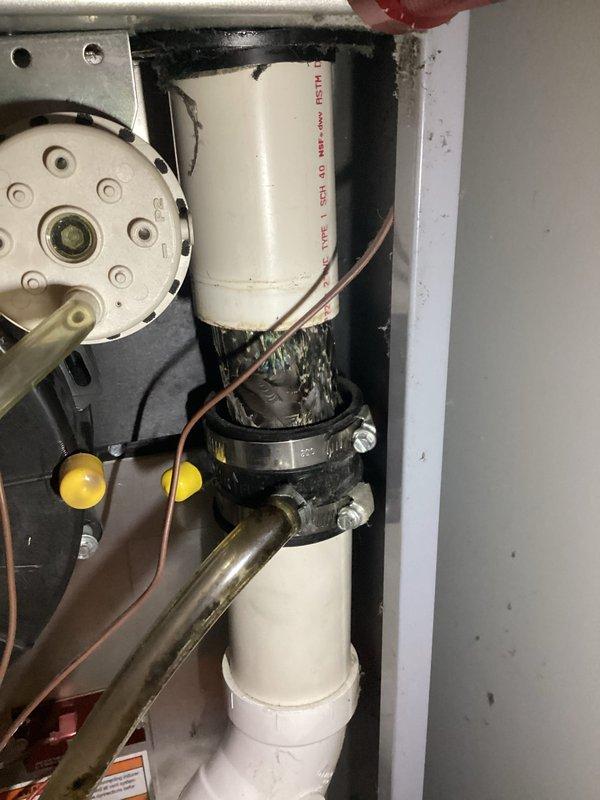 Responded to no-heat call on 15-year-old forced air furnace with reported pilot light failure and inoperative blower motor. Upon arrival, performed diagnostic testing of electrical components using digital multimeter to verify power supply and circuit continuity throughout the system. Testing revealed electrical fault preventing proper system operation. Inspected blower motor assembly, wiring connections, and control board terminals. Verified condensate drainage system and PVC piping were clear and properly configured. Restored system to full operational status with heat output confirmed before departure.