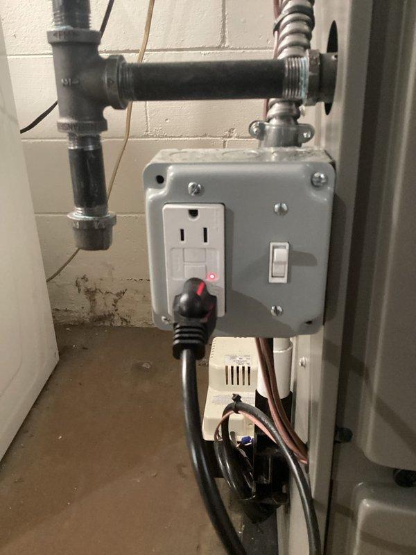 Responded to no heat call on 2-month-old furnace located in basement. Upon inspection, discovered condensate drain line improperly installed and obstructed, causing safety switch to prevent system operation. Cleared blockage, verified proper drainage flow, and tested all safety controls. System restored to full operation with heat output confirmed at proper specifications.