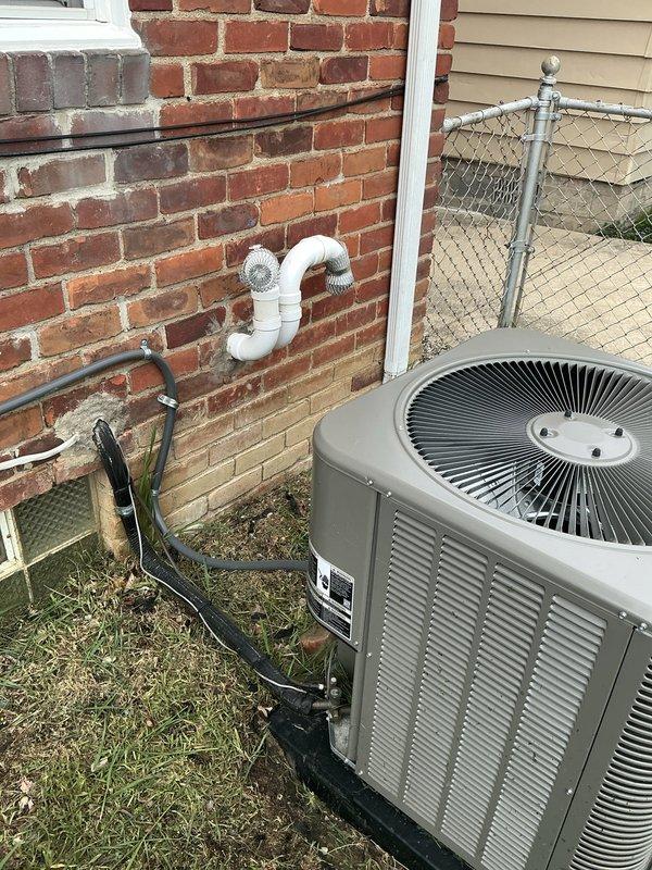 Responded to no-cool complaint on 4-year-old Goodman central air conditioning system with abnormal operating noise. Upon inspection, accessed control board housing and identified failed capacitor causing compressor to run inefficiently and produce unusual sounds. Replaced defective dual-run capacitor, verified proper voltage at control board terminals, and tested system operation. Unit now cooling properly with normal sound levels and amperage readings within manufacturer specifications.