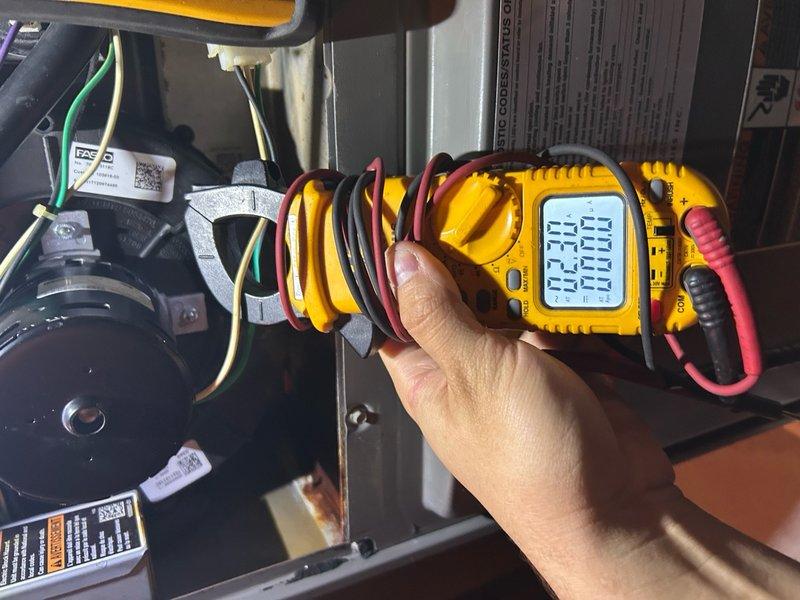 Responded to customer concern regarding increased electric bills following recent furnace repair on 14-year-old unit located in basement. Performed electrical diagnostics using clamp meter and multimeter to measure amperage draw and voltage readings on blower motor assembly and associated electrical components. Verified all electrical connections, tested motor operation, and documented current consumption levels to identify potential causes of elevated energy usage.