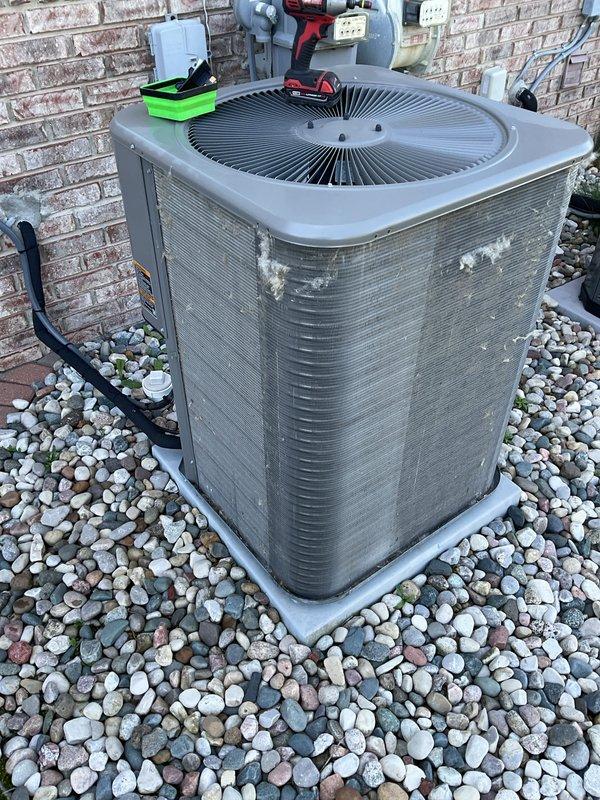 Completed annual cooling maintenance on residential air conditioning system. Performed comprehensive inspection of outdoor condenser unit, checked refrigerant levels using manifold gauges, cleaned condenser coils, verified proper airflow through louvers, and tested electrical connections and capacitor operation. Unit found operating within normal parameters with no deficiencies noted.