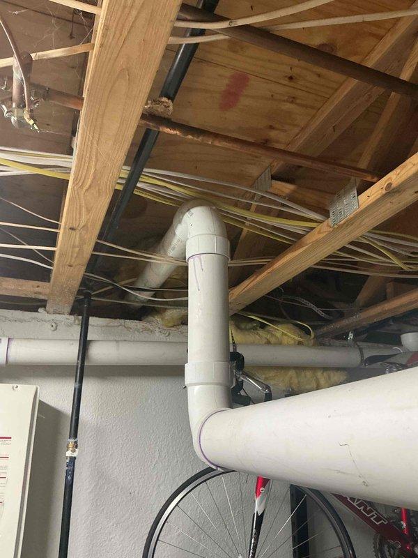 Conducted comprehensive full system HVAC evaluation for residential property with 16-year-old existing equipment. Assessed outdoor condensing unit positioned on concrete pad against brick exterior wall, including electrical disconnect and conduit routing. Evaluated indoor furnace installation located in unfinished ceiling space with existing ductwork and ventilation infrastructure. Provided complete system replacement estimate to address aging equipment, with customer requesting installation within the next couple weeks.