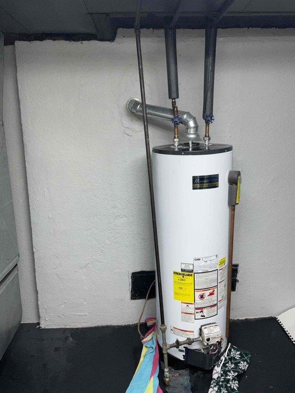 Conducted comprehensive assessment of non-functional water heater system in basement utility area to provide estimate for replacement options. Evaluated existing standard tank-type water heater installation, documented current unit configuration including piping connections, venting system, and mounting location. Presented customer with pricing and specifications for both tankless and standard water heater replacement options to determine optimal solution for their needs.
