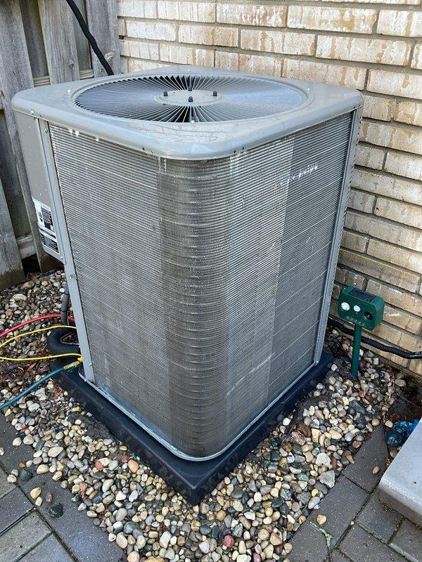 Completed scheduled Air Care Maintenance on residential outdoor condensing unit. Performed comprehensive system inspection, replaced air filter, cleaned condenser coils which showed heavy dust and dirt accumulation, and verified proper system operation. Unit tested and left in good working condition.